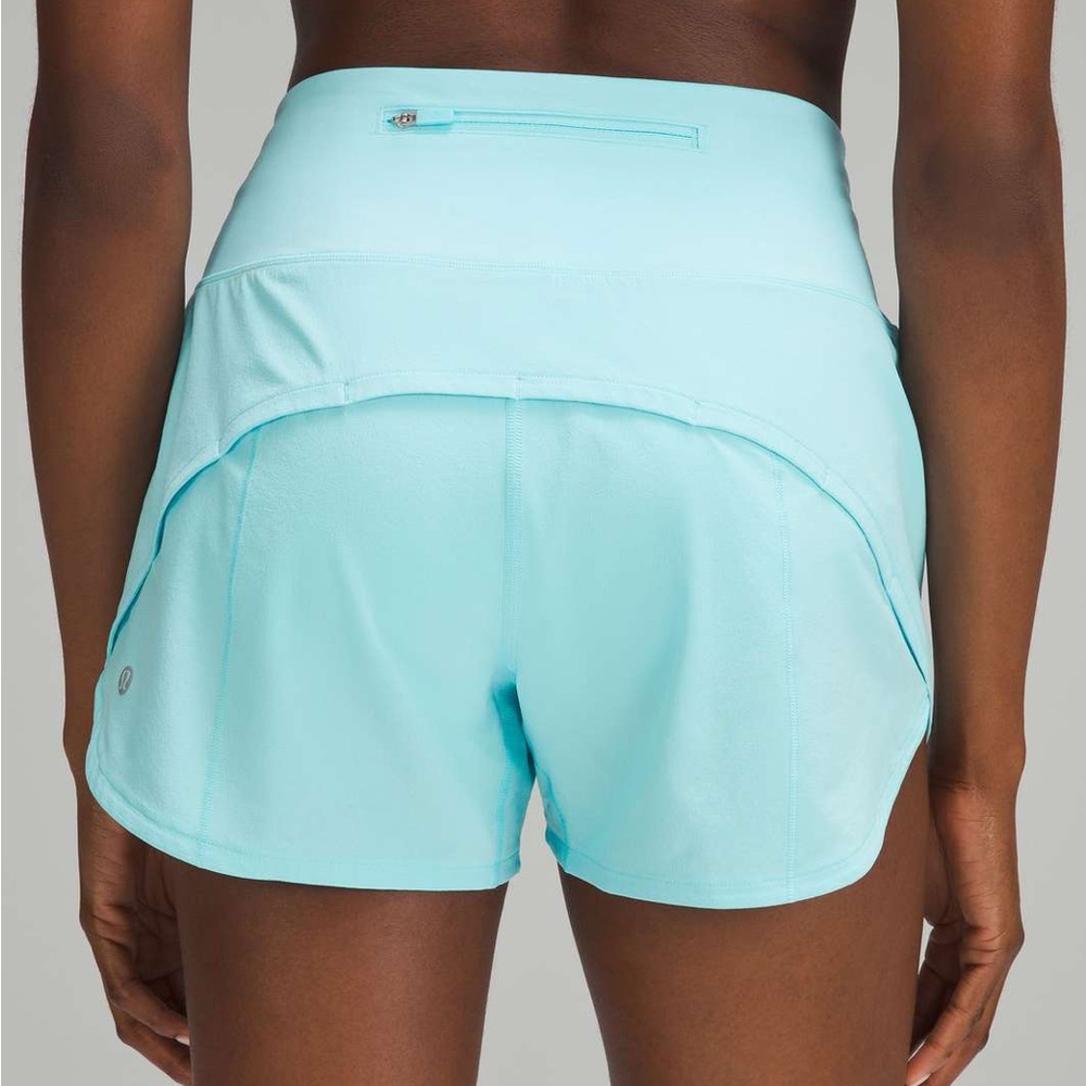Speed Up High Rise 4” shorts in Cyan Blue